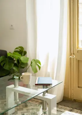 a bathroom with a toilet and a shower at Catalan Charm 3BR w 15 Baths in Barcelona