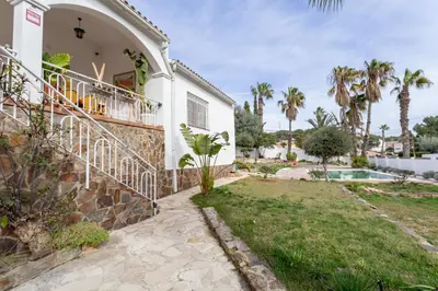 a view of the house from the garden at Ibiza style villa with swimming pool near Sitges in Cunit
