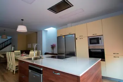 a kitchen with a sink and a counter top at Casa grande con piscina en el centro de Calella, Tramuntana in Calella