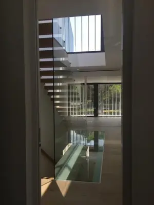 a view through a glass door of a building at Casa de lujo en Gavá mar in Gavà