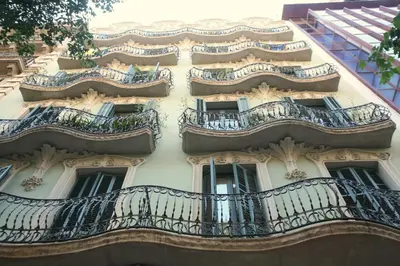a building with balconies on the side of it at The Conica Deluxe Bed&Breakfast in Barcelona