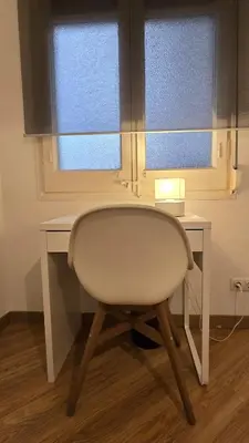 a white desk with a chair in front of a window at Opening Doors Sant Pau II Centric AACC in Barcelona