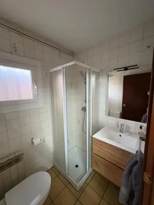 a bathroom with a shower and a sink and a toilet at casa en Palau in Palau-Solità i Plegamans
