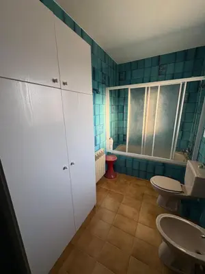 a bathroom with three sinks and a tub at casa en Palau in Palau-Solità i Plegamans