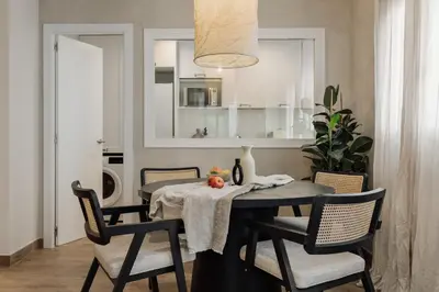a office with a desk with a computer on it at Balat - 2 bedrooms and terrace in Eixample Dreta in Barcelona