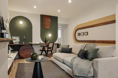 a dining room with a table and some chairs at Balat - 2 bedrooms and terrace in Eixample Dreta in Barcelona