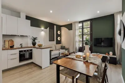 a bedroom with a bed with two books on it at Cinar - 2 bedrooms and balcony in Sant Antoni in Barcelona