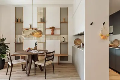 a living room with a couch and a table at Orosi - 2 bedrooms and balcony in Poble Sec in Barcelona