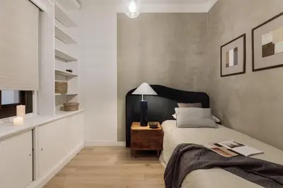 a white bathroom with a sink and a toilet and a tub at Serralada - 4 bedrooms and terrace in Sant Gervasi in Barcelona