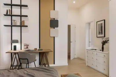 a bedroom with a bed with two lamps and a picture at Hidiv - 3 bedrooms and terrace in Eixample Dreta in Barcelona