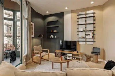 a bathroom with a shower and a sink and a mirror at Hidiv - 3 bedrooms and terrace in Eixample Dreta in Barcelona