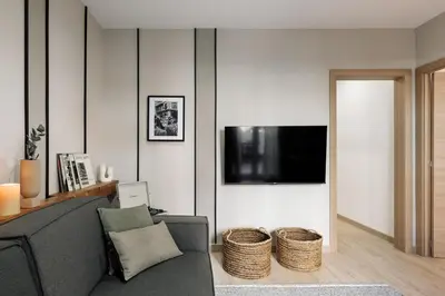 a kitchen with white cabinets and a sink at Llaberia - 2 bedrooms in Sant Gervasy in Barcelona