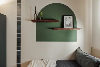 a bedroom with two beds and a mirror at Izmit - 2 bedrooms and balcony in Sant Pere in Barcelona