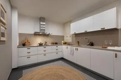 a desk in a window with a book at Tanah - 3 bedrooms and balcony in Eixample Dreta in Barcelona