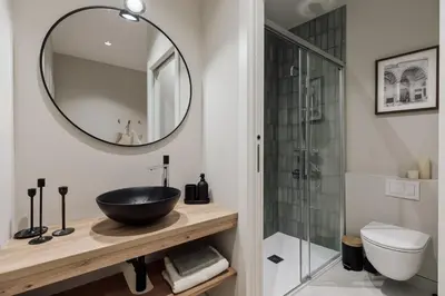 a bathroom with a sink and a mirror at Cesme - 2 bedrooms and balcony in Sant Pere in Barcelona