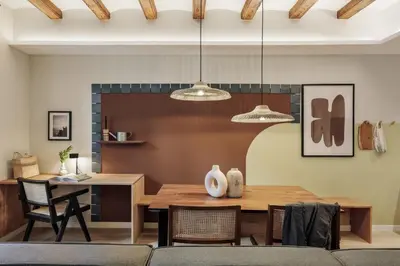 a living room with a couch and a tv at Ipek - 2 bedrooms and balcony in Sant Pere in Barcelona