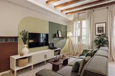 a bedroom with a bed and a window at Ipek - 2 bedrooms and balcony in Sant Pere in Barcelona