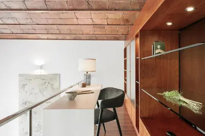 a kitchen with a washer and dryer in a room at Agerola - 2 bedrooms in Eixample Dreta in Barcelona