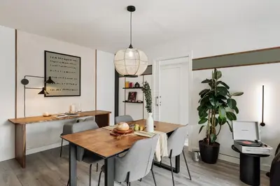 a table and two chairs on a balcony with a view at Aliga - 3 bedroom and pool in Les Corts in Barcelona