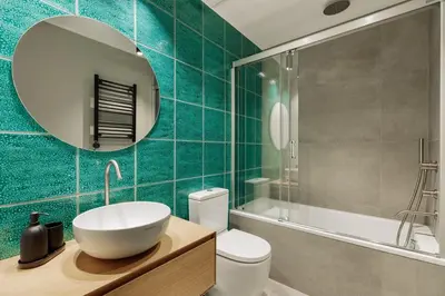 a patio with a couch and two chairs and a table at Gaudi - 3 bedrooms and terrace in Sant Gervasi in Barcelona