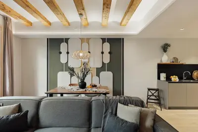 a living room with a couch and a table at Deisis - 2 bedrooms and balcony in Sant Pere in Barcelona