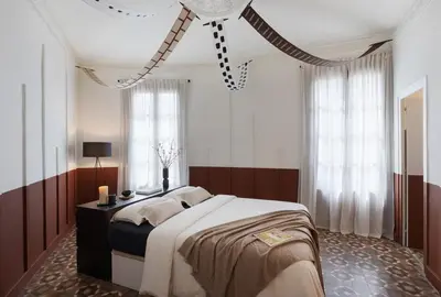 a living room with a blue couch and a table at Taoudeni - 3 bedrooms in Eixample Esquerra in Barcelona