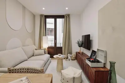 a kitchen and dining room with a table and chairs at Cantone - 2 bedrooms, balcony and terrace in Ciutat Vella in Barcelona