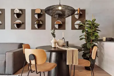 a kitchen and living room with a table and chairs at Kline - 2 bedrooms and terrace in Sant Antoni in Barcelona
