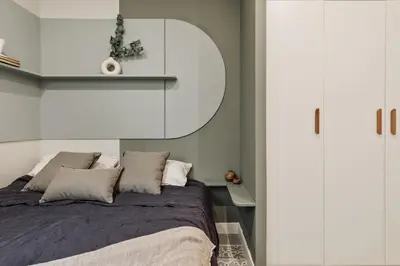a bedroom with a bed and a white cabinet at Tikal - 3 bedrooms and balcony in Sant Gervasi in Barcelona