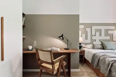 a bedroom with a large bed with two lamps at Llum - 1 bedroom and balcony in Sant Antoni in Barcelona