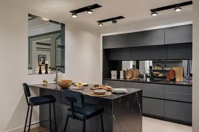 a bedroom and a living room with a bed and a table at Mavi - 2 bedrooms and balcony in Eixample Dreta in Barcelona