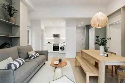 a bathroom with a toilet and a sink and a shower at Baronissi - 2 bedrooms and terrace in Ciutat Vella in Barcelona