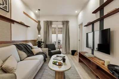 a bathroom with a toilet and a sink and a shower at Kayra - 2 bedrooms and terrace in La Sagrada Familia in Barcelona
