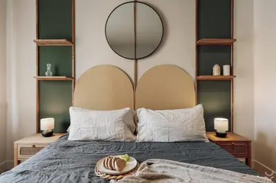 a bedroom with a bed and a framed picture at Sariyer - 2 bedrooms and balcony in El Putxet in Barcelona