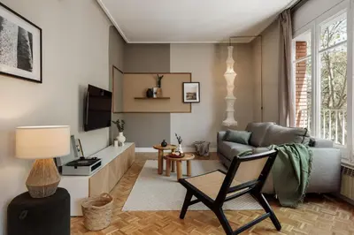 a bathroom with a shower and a toilet and a sink at Cahuita - 2 bedrooms and office in Sants in Barcelona