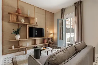 a bathroom with a toilet and a sink and a shower at Baru - 2 bedrooms and terrace in Eixample Esquerra in Barcelona