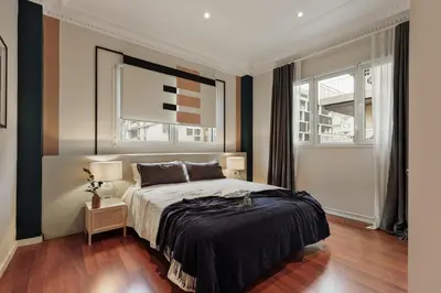 a dining room with a table and chairs at Sark - 3 bedrooms and balcony in Sant Gervasi in Barcelona