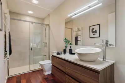 a bathroom with a sink and a shower at Sark - 3 bedrooms and balcony in Sant Gervasi in Barcelona