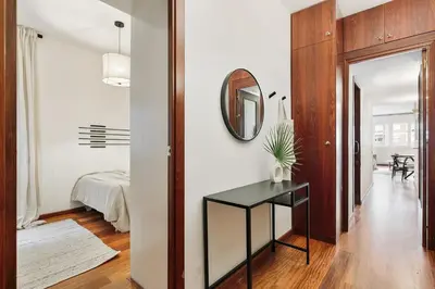 a bedroom with a bed and a mirror at Tramonto - 3 bedrooms and balcony in Sant Antoni in Barcelona