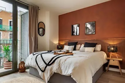 a dining room with a table and chairs at Kufra - 3 bedrooms in Eixample Esquerra in Barcelona