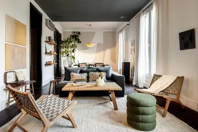 a bedroom with a large bed and a window at Depok - 2 bedrooms and balcony in Eixample Dreta in Barcelona