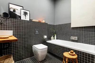 a wooden door in a room with a hallway at Depok - 2 bedrooms and balcony in Eixample Dreta in Barcelona
