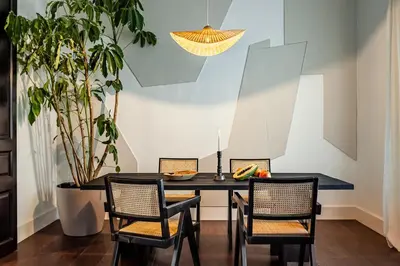 a room with a balcony with a table and chairs at Depok - 2 bedrooms and balcony in Eixample Dreta in Barcelona