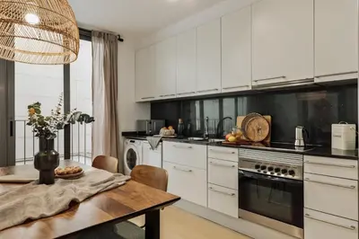 a living room with a couch and a table at Peri - 2 bedrooms in Sant Pere in Barcelona