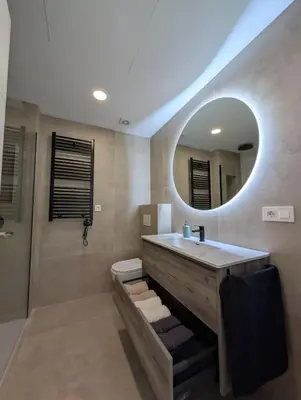 a bathroom with a sink and a mirror at Ca l'Emília, hasta 6 pers, Monistrol de Montserrat in Monistrol