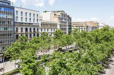 a view of a city with trees and buildings at Sweett - Paseo de Gracia - City Centre in Barcelona