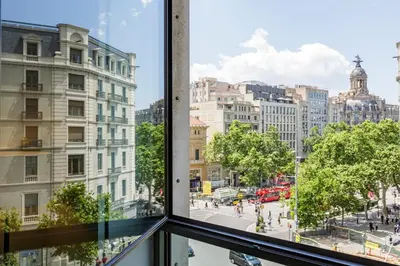 a view of a city street from a window at Sweett - Paseo de Gracia - City Centre in Barcelona