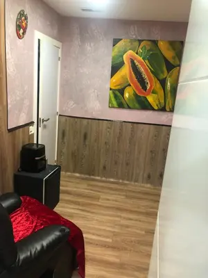 a room with a painting of fruit on the wall at Piso para pareja in Barcelona