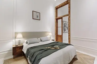 a living room with a couch and a table at Reus - 1 bedroom in Ciutat Vella in Barcelona