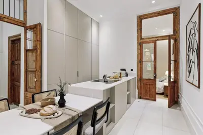 a bathroom with a white tub and a sink at Reus - 1 bedroom in Ciutat Vella in Barcelona